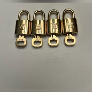 COPY - Authentic Louis Vuitton padlocks with single key.